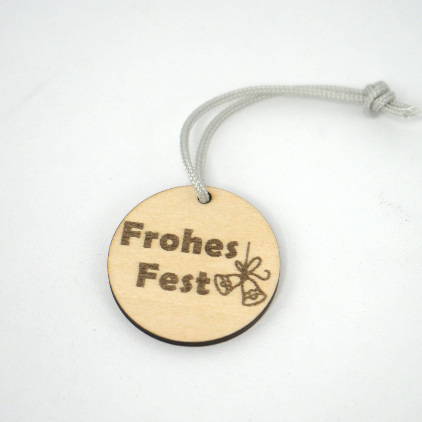 Geschenkanhänger Holz „Frohes Fest“ mit Glockenmotiv