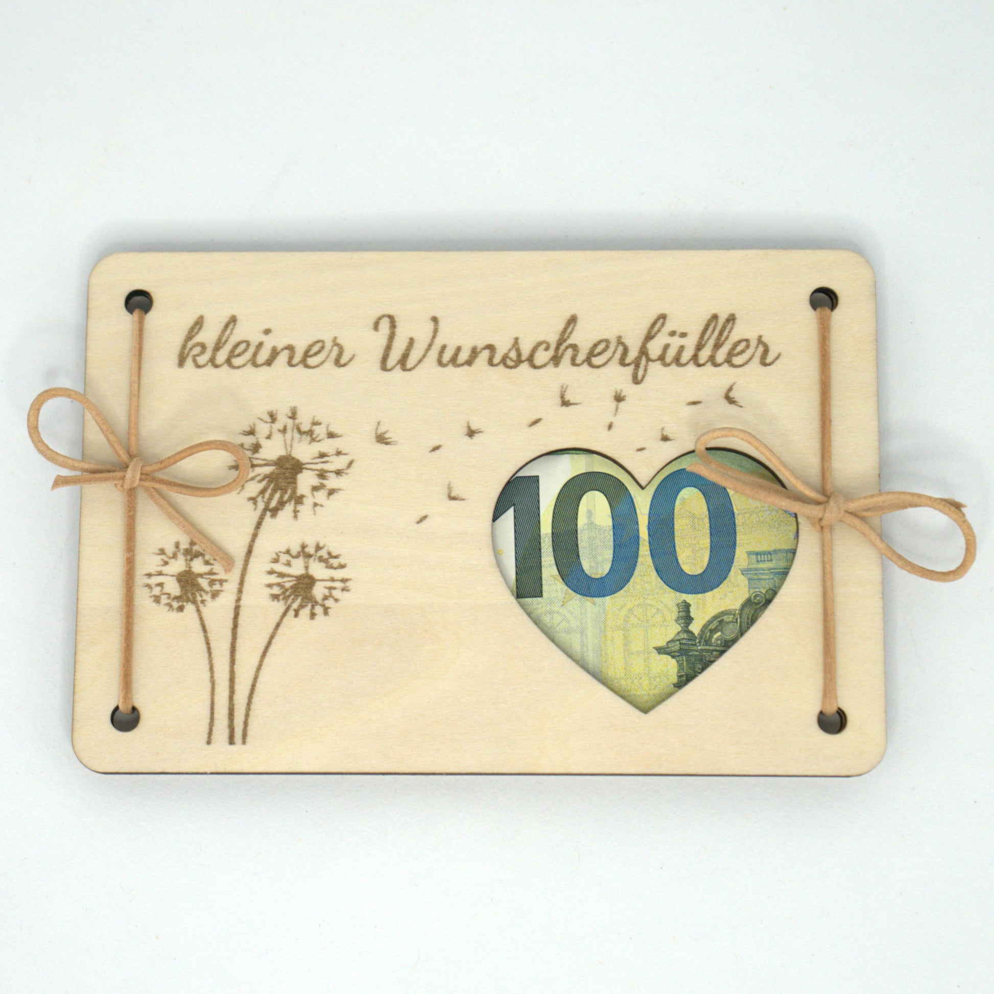 Geldgeschenk „Kleiner Wunscherfüller“ mit eingelegtem Geldschein im Herz