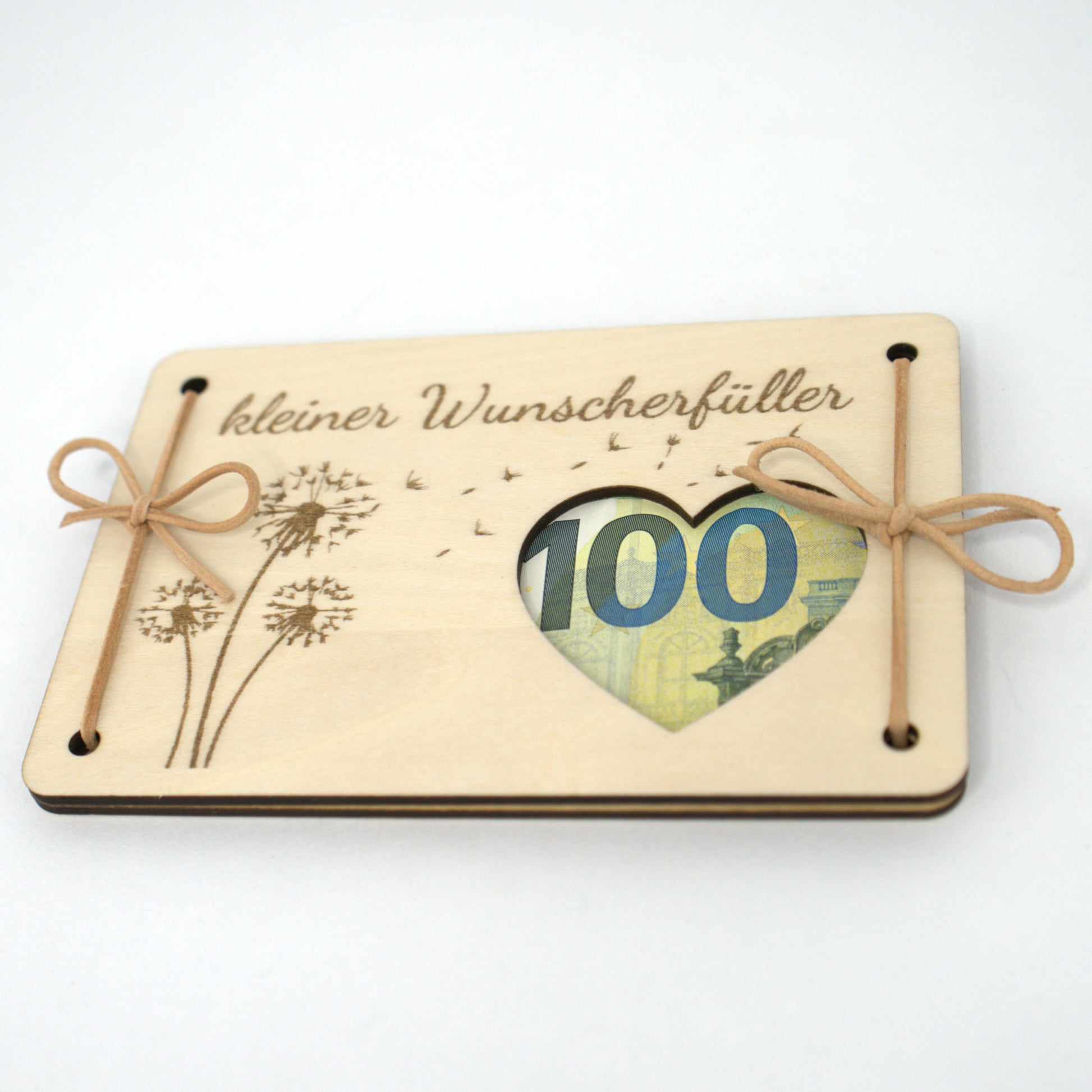 Holzkarte mit Pusteblumen und Herz-Aussparung – Geldschein sichtbar eingesetzt