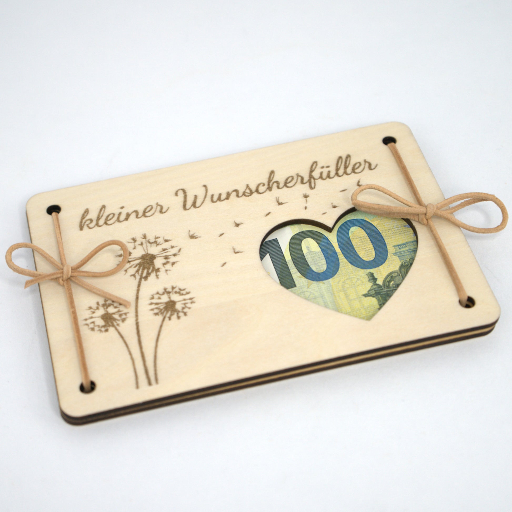 Detailaufnahme des Geldgeschenks „Kleiner Wunscherfüller“ aus Holz mit Lederbändern