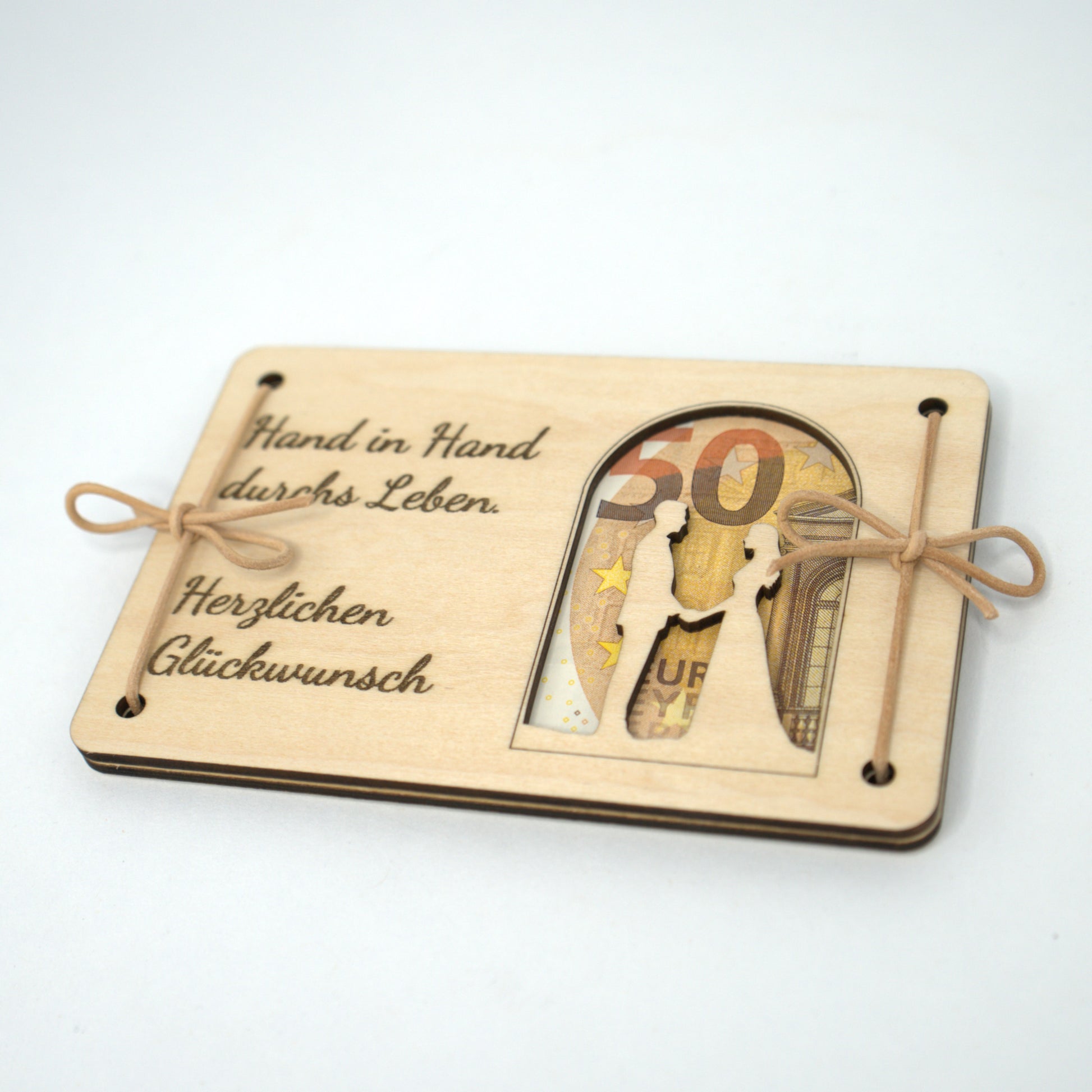 Hochzeitsgeschenk aus Holz mit Lederbändern und Brautpaar-Motiv